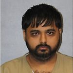 Cumberland pizza shop owner arrested