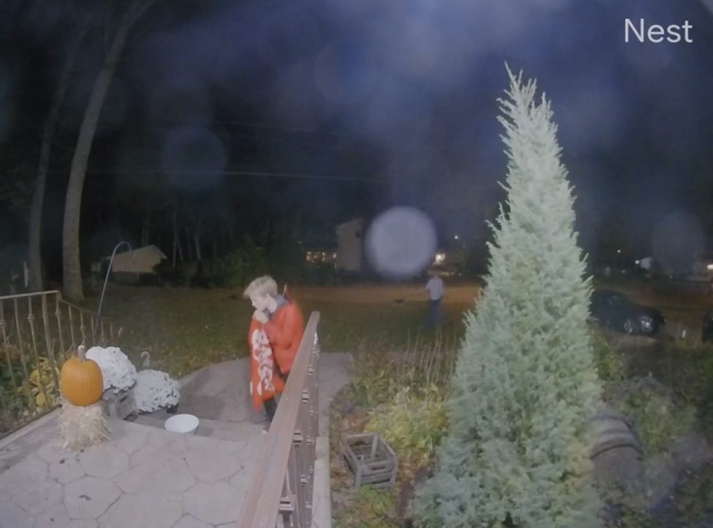 Trick-or-treater refills empty bowl