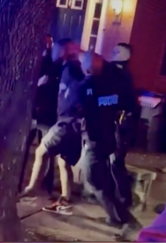 Providence police hitting man handcuffs